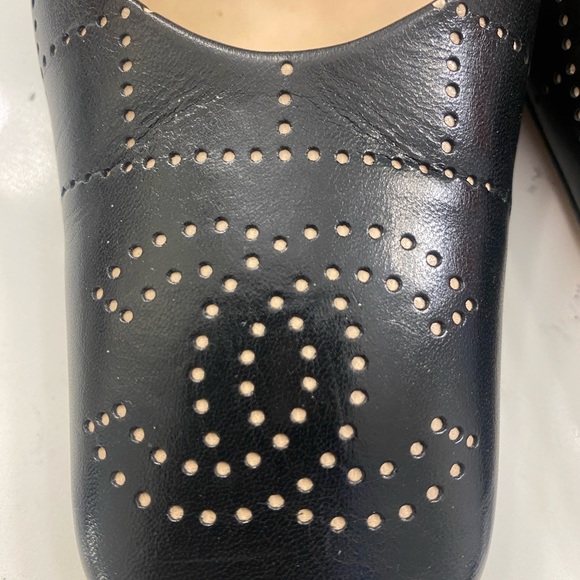 Gorgeous CHANEL heels black with bone colored quilting and CC monogram at toes. - Picture 9 of 13